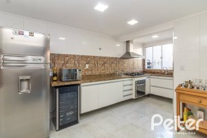 Casa em Condomínio à venda com 159m², 3 dormitórios, 1 suíte, 2 vagas, no bairro Tristeza em Porto Alegre