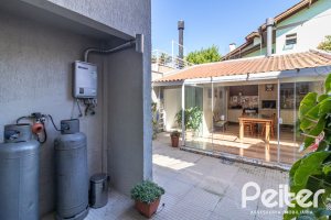 Casa em Condomínio à venda com 159m², 3 dormitórios, 1 suíte, 2 vagas, no bairro Tristeza em Porto Alegre