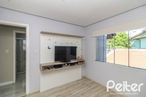 Casa em Condomínio à venda com 159m², 3 dormitórios, 1 suíte, 2 vagas, no bairro Tristeza em Porto Alegre