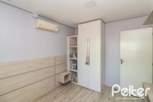 Casa em Condomínio à venda com 159m², 3 dormitórios, 1 suíte, 2 vagas, no bairro Tristeza em Porto Alegre