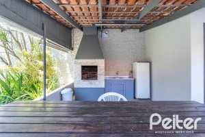 Casa em Condomínio à venda com 159m², 3 dormitórios, 1 suíte, 2 vagas, no bairro Tristeza em Porto Alegre