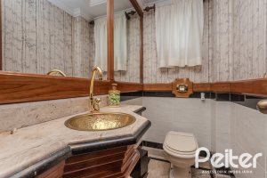 Casa à venda com 290m², 3 dormitórios, 1 suíte, 2 vagas, no bairro Ipanema em Porto Alegre