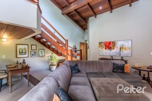 Casa em Condomínio à venda com 600m², 5 dormitórios, 5 suítes, 4 vagas, no bairro Cavalhada em Porto Alegre