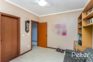 Casa em Condomínio à venda com 600m², 5 dormitórios, 5 suítes, 4 vagas, no bairro Cavalhada em Porto Alegre