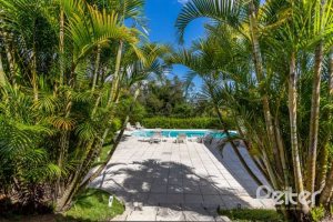 Casa em Condomínio à venda com 600m², 5 dormitórios, 5 suítes, 4 vagas, no bairro Cavalhada em Porto Alegre