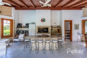 Casa em Condomínio à venda com 600m², 5 dormitórios, 5 suítes, 4 vagas, no bairro Cavalhada em Porto Alegre