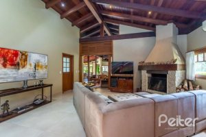 Casa em Condomínio à venda com 600m², 5 dormitórios, 5 suítes, 4 vagas, no bairro Cavalhada em Porto Alegre