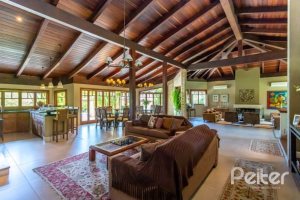 Casa em Condomínio à venda com 600m², 5 dormitórios, 5 suítes, 4 vagas, no bairro Cavalhada em Porto Alegre