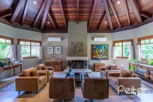 Casa em Condomínio à venda com 600m², 5 dormitórios, 5 suítes, 4 vagas, no bairro Cavalhada em Porto Alegre