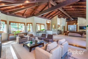 Casa em Condomínio à venda com 600m², 5 dormitórios, 5 suítes, 4 vagas, no bairro Cavalhada em Porto Alegre