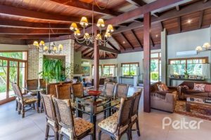 Casa em Condomínio à venda com 600m², 5 dormitórios, 5 suítes, 4 vagas, no bairro Cavalhada em Porto Alegre