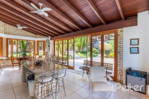 Casa em Condomínio à venda com 600m², 5 dormitórios, 5 suítes, 4 vagas, no bairro Cavalhada em Porto Alegre