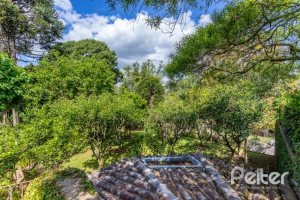 Casa em Condomínio à venda com 600m², 5 dormitórios, 5 suítes, 4 vagas, no bairro Cavalhada em Porto Alegre