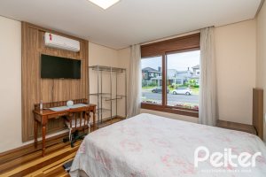 Casa em Condomínio à venda com 226m², 4 dormitórios, 4 suítes, 4 vagas, no bairro Terra Ville em PORTO ALEGRE