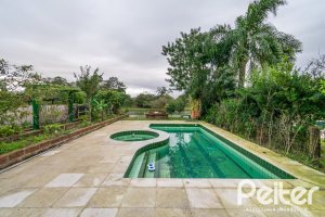 Casa em Condomínio à venda com 226m², 4 dormitórios, 4 suítes, 4 vagas, no bairro Terra Ville em PORTO ALEGRE