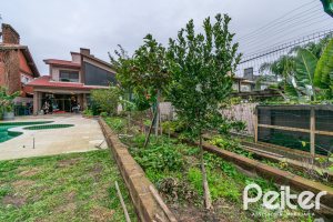 Casa em Condomínio à venda com 226m², 4 dormitórios, 4 suítes, 4 vagas, no bairro Terra Ville em PORTO ALEGRE