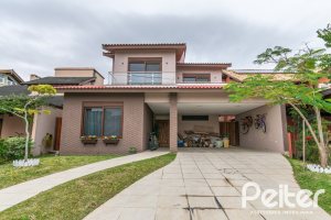 Casa em Condomínio à venda com 226m², 4 dormitórios, 4 suítes, 4 vagas, no bairro Terra Ville em PORTO ALEGRE