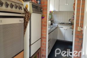 Casa à venda com 428m², 5 dormitórios, 4 suítes, 8 vagas, no bairro Vila Assunção em Porto Alegre