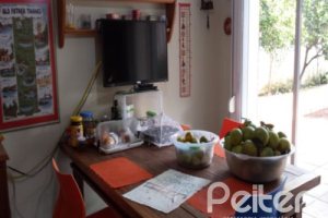 Casa à venda com 428m², 5 dormitórios, 4 suítes, 8 vagas, no bairro Vila Assunção em Porto Alegre