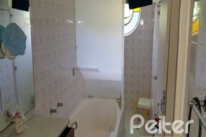 Casa à venda com 428m², 5 dormitórios, 4 suítes, 8 vagas, no bairro Vila Assunção em Porto Alegre