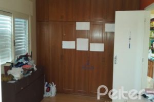 Casa à venda com 428m², 5 dormitórios, 4 suítes, 8 vagas, no bairro Vila Assunção em Porto Alegre