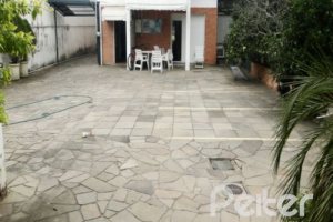 Casa à venda com 428m², 5 dormitórios, 4 suítes, 8 vagas, no bairro Vila Assunção em Porto Alegre