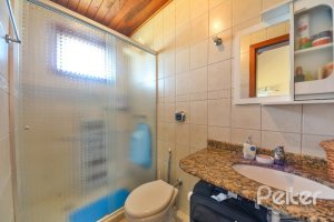 Casa em Condomínio à venda com 252m², 3 dormitórios, 1 suíte, 3 vagas, no bairro Tristeza em Porto Alegre