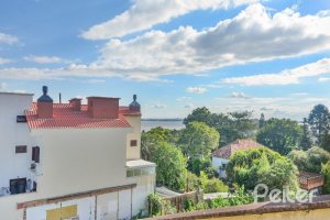 Casa em Condomínio à venda com 252m², 3 dormitórios, 1 suíte, 3 vagas, no bairro Tristeza em Porto Alegre