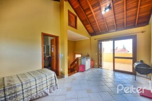 Casa em Condomínio à venda com 252m², 3 dormitórios, 1 suíte, 3 vagas, no bairro Tristeza em Porto Alegre