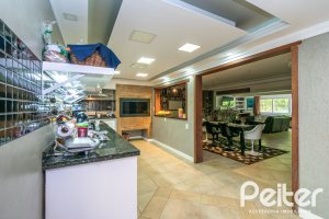 Casa à venda com 400m², 3 dormitórios, 2 suítes, 4 vagas, no bairro Jardim Isabel em Porto Alegre