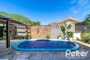 Casa à venda com 400m², 3 dormitórios, 2 suítes, 4 vagas, no bairro Jardim Isabel em Porto Alegre