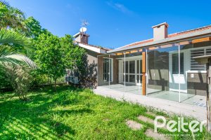 Casa à venda com 400m², 3 dormitórios, 2 suítes, 4 vagas, no bairro Jardim Isabel em Porto Alegre