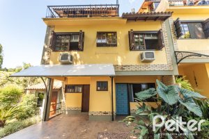 Casa em Condomínio à venda com 162m², 3 dormitórios, 2 suítes, 2 vagas, no bairro Tristeza em Porto Alegre