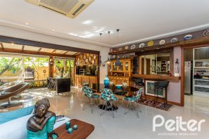 Casa em Condomínio à venda com 380m², 4 dormitórios, 2 suítes, 3 vagas, no bairro Tristeza em PORTO ALEGRE