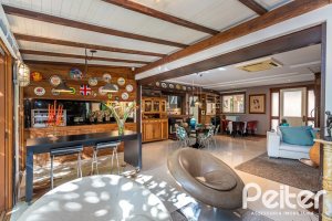 Casa em Condomínio à venda com 380m², 4 dormitórios, 2 suítes, 3 vagas, no bairro Tristeza em PORTO ALEGRE