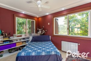 Casa em Condomínio à venda com 380m², 4 dormitórios, 2 suítes, 3 vagas, no bairro Tristeza em PORTO ALEGRE