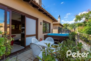 Casa em Condomínio à venda com 380m², 4 dormitórios, 2 suítes, 3 vagas, no bairro Tristeza em PORTO ALEGRE