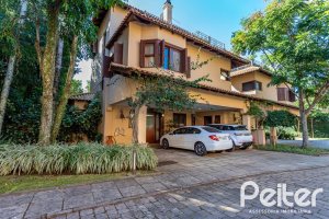 Casa em Condomínio à venda com 380m², 4 dormitórios, 2 suítes, 3 vagas, no bairro Tristeza em PORTO ALEGRE