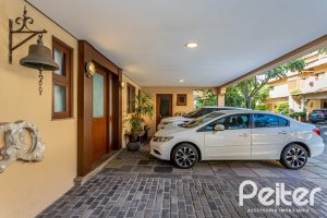 Casa em Condomínio à venda com 380m², 4 dormitórios, 2 suítes, 3 vagas, no bairro Tristeza em PORTO ALEGRE