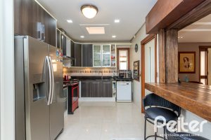 Casa em Condomínio à venda com 380m², 4 dormitórios, 2 suítes, 3 vagas, no bairro Tristeza em PORTO ALEGRE