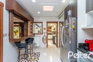 Casa em Condomínio à venda com 380m², 4 dormitórios, 2 suítes, 3 vagas, no bairro Tristeza em PORTO ALEGRE