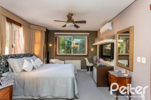 Casa em Condomínio à venda com 380m², 4 dormitórios, 2 suítes, 3 vagas, no bairro Tristeza em PORTO ALEGRE