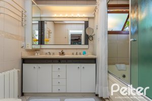 Casa em Condomínio à venda com 380m², 4 dormitórios, 2 suítes, 3 vagas, no bairro Tristeza em PORTO ALEGRE