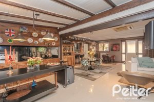 Casa em Condomínio à venda com 380m², 4 dormitórios, 2 suítes, 3 vagas, no bairro Tristeza em PORTO ALEGRE