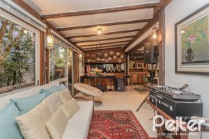 Casa em Condomínio à venda com 380m², 4 dormitórios, 2 suítes, 3 vagas, no bairro Tristeza em PORTO ALEGRE