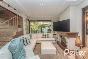 Casa em Condomínio à venda com 380m², 4 dormitórios, 2 suítes, 3 vagas, no bairro Tristeza em PORTO ALEGRE