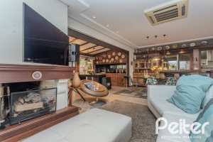 Casa em Condomínio à venda com 380m², 4 dormitórios, 2 suítes, 3 vagas, no bairro Tristeza em PORTO ALEGRE