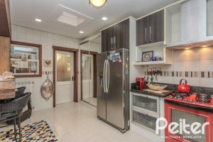Casa em Condomínio à venda com 380m², 4 dormitórios, 2 suítes, 3 vagas, no bairro Tristeza em PORTO ALEGRE