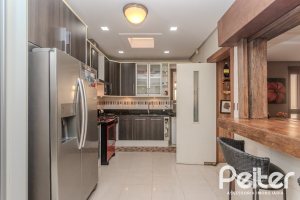 Casa em Condomínio à venda com 380m², 4 dormitórios, 2 suítes, 3 vagas, no bairro Tristeza em PORTO ALEGRE