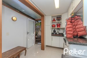 Casa em Condomínio à venda com 380m², 4 dormitórios, 2 suítes, 3 vagas, no bairro Tristeza em PORTO ALEGRE